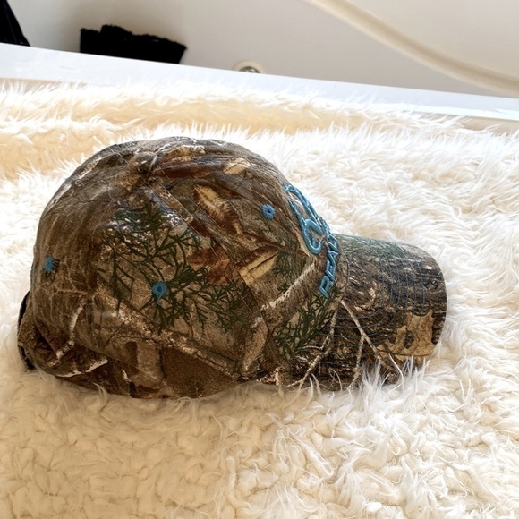 Women's Realtree Baseball Cap Camo with teal trim. - Picture 5 of 8